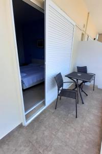 Postel nebo postele na pokoji v ubytování Nikolaki Rooms