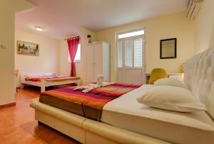 Katil atau katil-katil dalam bilik di Splendid Apartments