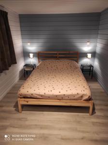 מיטה או מיטות בחדר ב-La Coccinelle