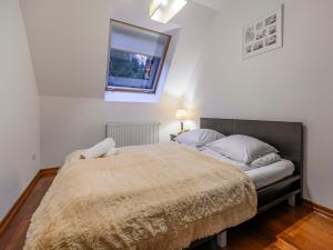 Posteľ alebo postele v izbe v ubytovaní VisitZakopane - Amber Apartment