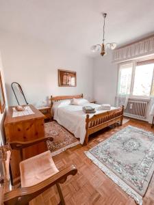 A bed or beds in a room at Casa Vacanze Annarita