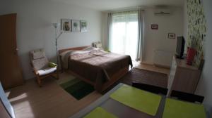 Postel nebo postele na pokoji v ubytování Club 218 Prémium Wellness Apartman