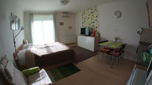 Postel nebo postele na pokoji v ubytování Club 218 Prémium Wellness Apartman