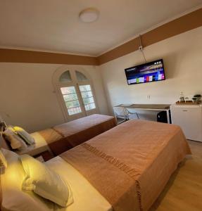 Postel nebo postele na pokoji v ubytování Angatu Hostel + 37 fotografií