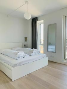 Postel nebo postele na pokoji v ubytování ApartmentInCopenhagen Apartment 1453