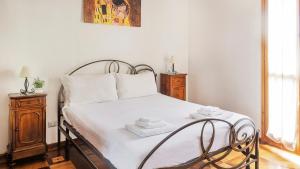 Postel nebo postele na pokoji v ubytování Welcomely - Bed and Dream