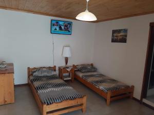 Posteľ alebo postele v izbe v ubytovaní Chiona΄s Apartments by the Sea