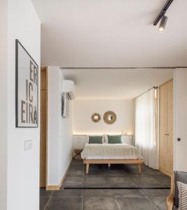 Cama ou camas em um quarto em Ericeira Prime Villas