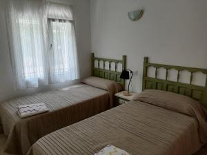 Posteľ alebo postele v izbe v ubytovaní Apartamentos Vista + 37 fotografií