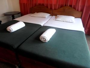 Letto o letti in una camera di Drop Hostel