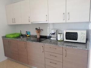 Kuchyňa alebo kuchynka v ubytovaní Apartamentos Vista