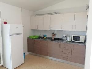 Kuchyňa alebo kuchynka v ubytovaní Apartamentos Vista