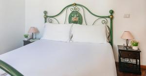 Postel nebo postele na pokoji v ubytování Welcomely - Bed and Dream