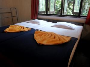 Letto o letti in una camera di Drop Hostel
