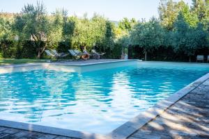 Bazén v ubytovaní Hotel & Spa Villa dei Mosaici alebo v jeho blízkosti