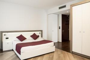 Voodi või voodid majutusasutuse Hotel Corte Del Paggio toas