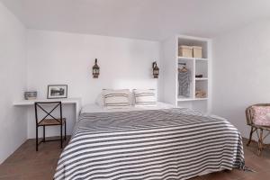 Cama o camas de una habitación en Eole Tarifa Rooms
