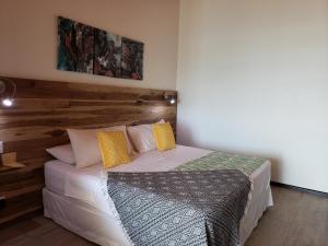 Postel nebo postele na pokoji v ubytování Pura Vista Hotel