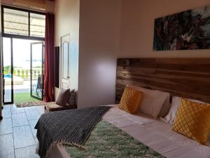 Postel nebo postele na pokoji v ubytování Pura Vista Hotel