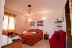 Postel nebo postele na pokoji v ubytování Villaggio La Pizzuta + 35 fotografií