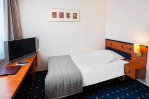 Łóżko lub łóżka w pokoju w obiekcie Qubus Hotel Głogów
