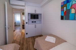 Kuchyň nebo kuchyňský kout v ubytování PINNA RESIDENCE - SV. JEROLIM