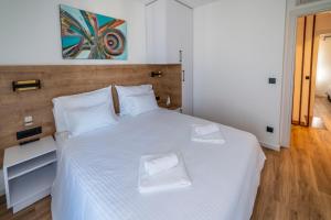 Postel nebo postele na pokoji v ubytování PINNA RESIDENCE - SV. JEROLIM