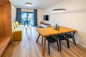 TV a/nebo společenská místnost v ubytování PINNA RESIDENCE - SV. JEROLIM