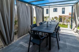 Patio nebo venkovní prostory v ubytování PINNA RESIDENCE - SV. JEROLIM