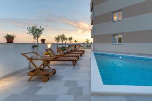 Bazén v ubytování Oliva Vallis Apartments nebo v jeho okolí