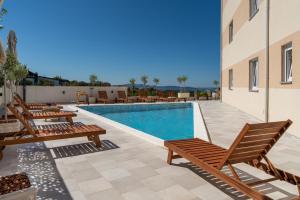Bazén v ubytování Oliva Vallis Apartments nebo v jeho okolí