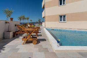 Bazén v ubytování Oliva Vallis Apartments nebo v jeho okolí
