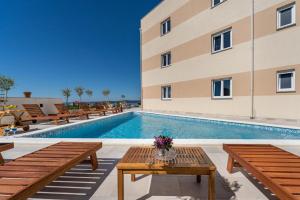 Bazén v ubytování Oliva Vallis Apartments nebo v jeho okolí