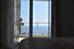 Posteľ alebo postele v izbe v ubytovaní Alto Ver Rooms