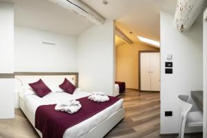 Voodi või voodid majutusasutuse Hotel Corte Del Paggio toas