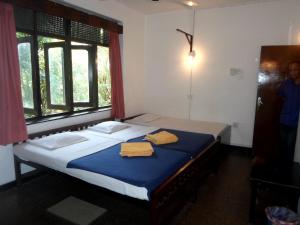Letto o letti in una camera di Drop Hostel