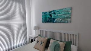 Posteľ alebo postele v izbe v ubytovaní APARTAMENTOS MINA4 tipo I