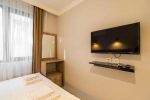 Μια τηλεόραση ή/και κέντρο ψυχαγωγίας στο SEHZADE HOTEL +80 φωτογραφίες