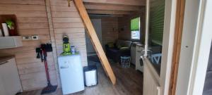 an overhead view of a tiny house with a refrigerator at Sabine's Wellnesslodge in Ruppertsweiler