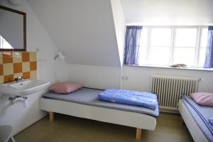 Postel nebo postele na pokoji v ubytování STF Vandrarhem Backåkra