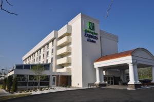 a hotel with a sign on the front of a building at Holiday Inn Express Milford, an IHG Hotel in Milford