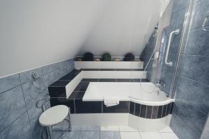 Kúpeľňa v ubytovaní Elita Hotel & Restauracja