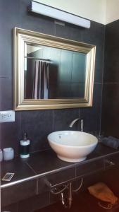 Koupelna v ubytování Pura Vista Hotel + 37 fotografií