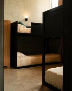 Postelja oz. postelje v sobi nastanitve Tava Glamping Cerro
