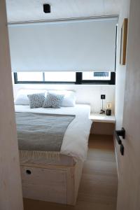 Posteľ alebo postele v izbe v ubytovaní Boutique style eco-beachhouse, private jacuzzi + 37 fotografií