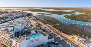an aerial view of a harbor with a marina at AP Eva Senses in Faro