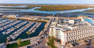 an aerial view of a marina with a hotel at AP Eva Senses in Faro