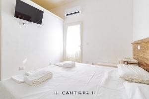 Postel nebo postele na pokoji v ubytování Il Cantiere - Casa Di Una Volta.