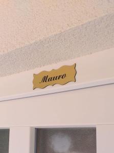 a sign that says mimo on a ceiling at Rooms Korina & Mauro Ropa Mljet in Ropa