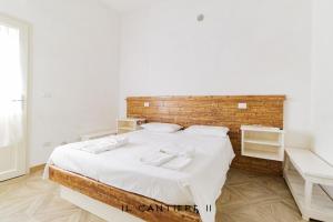Postel nebo postele na pokoji v ubytování Il Cantiere - Casa Di Una Volta.